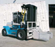 Handling of paper bales with integrated clamp unit (10-13.6 tons).
