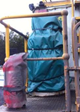 PVC cover over heater jacket and pump on truck grease tank