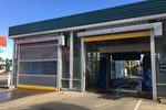A high speed door solution for noise and overspray for carwashes